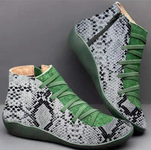Women's flat casual booties with wedge heel and round toe in multiple colour options.