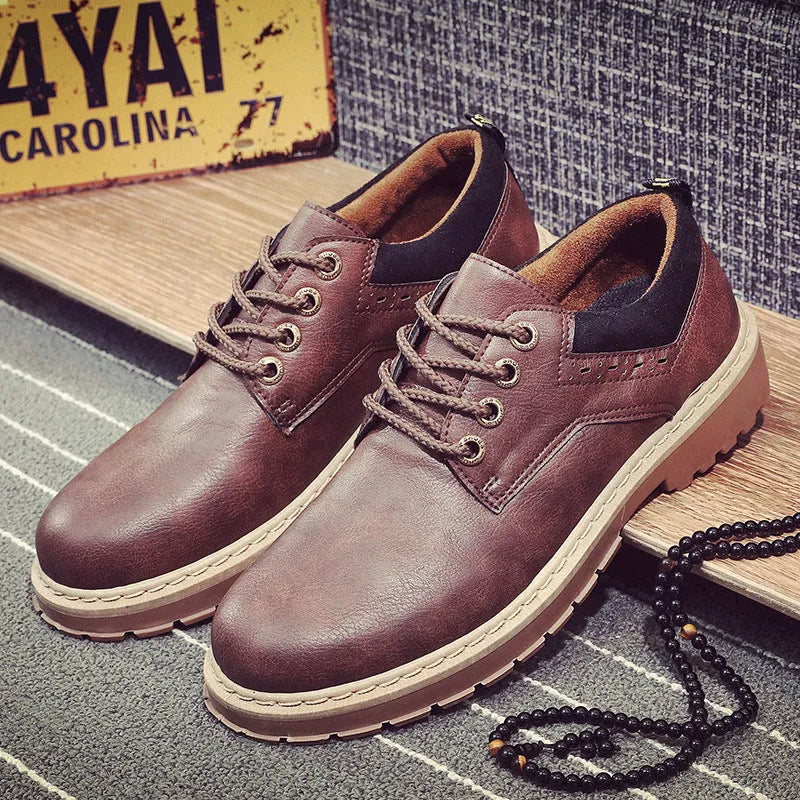 Men's black casual shoes with round toe, flat heel, and front lace-up closure.