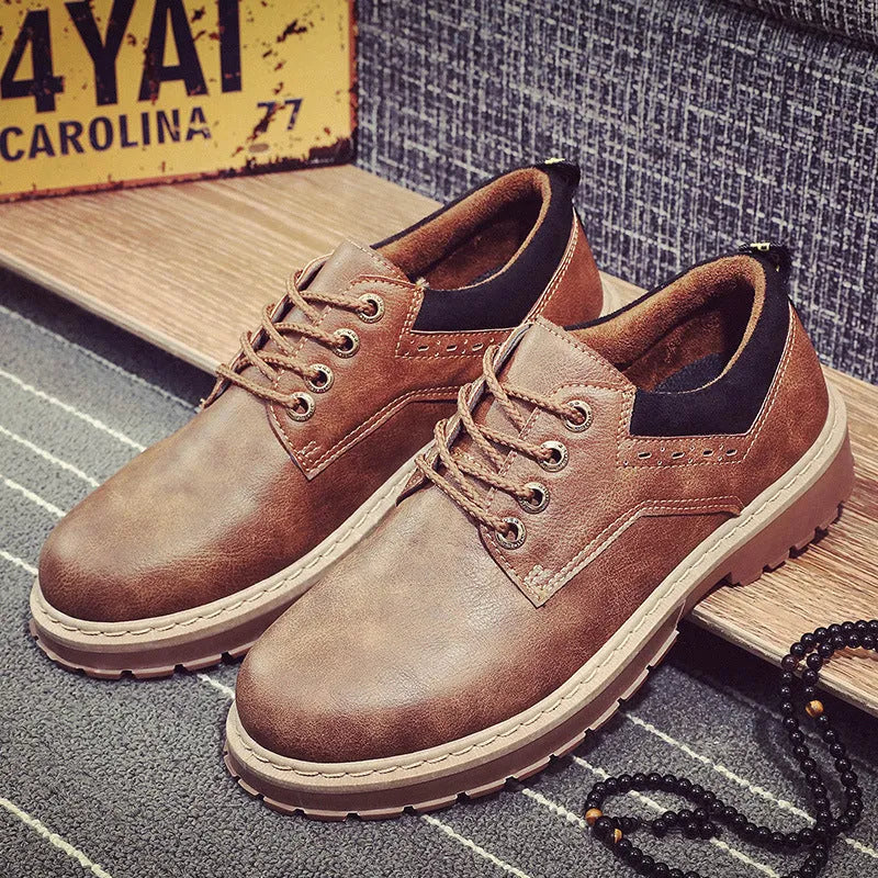 Men's black casual shoes with round toe, flat heel, and front lace-up closure.