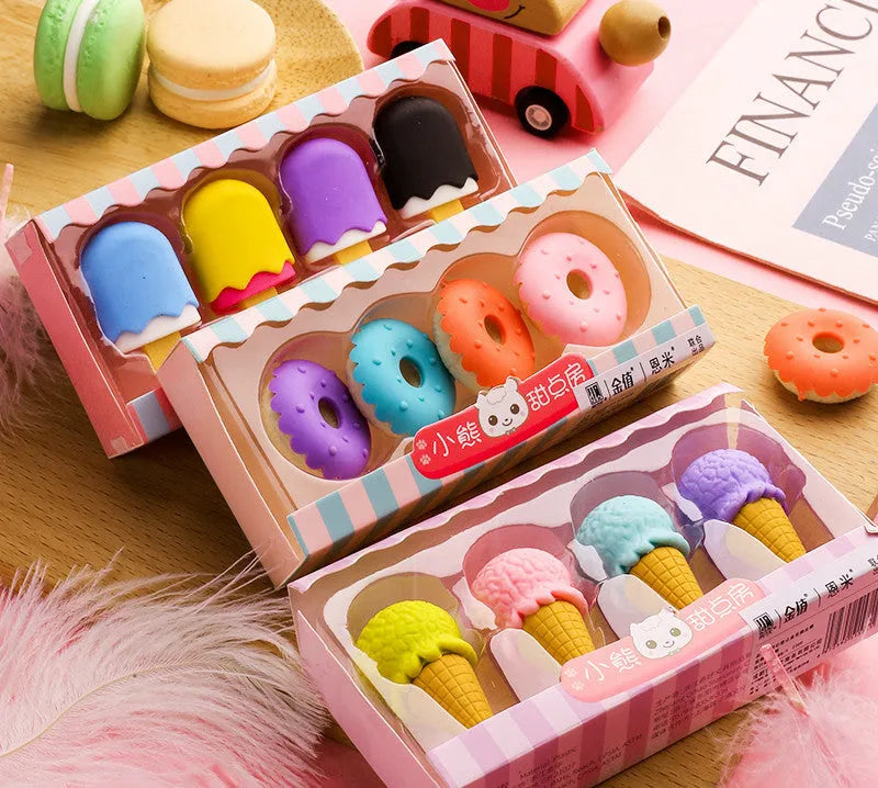 Set of 12 colourful cartoon food erasers including ice creams, donuts, lollipops, and cones.