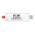 Black metal A300U software defined radio receiver with USB cable and golden SMA antenna connector