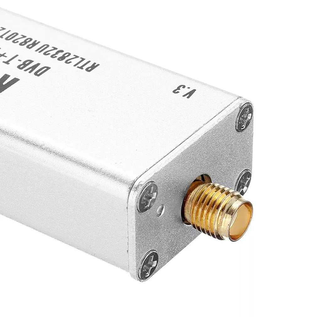 Black metal A300U software defined radio receiver with USB cable and golden SMA antenna connector