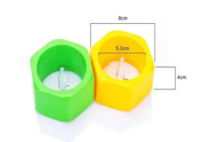 Yellow and green kitchen vegetable cutter with spiral knife mechanism for slicing cucumbers