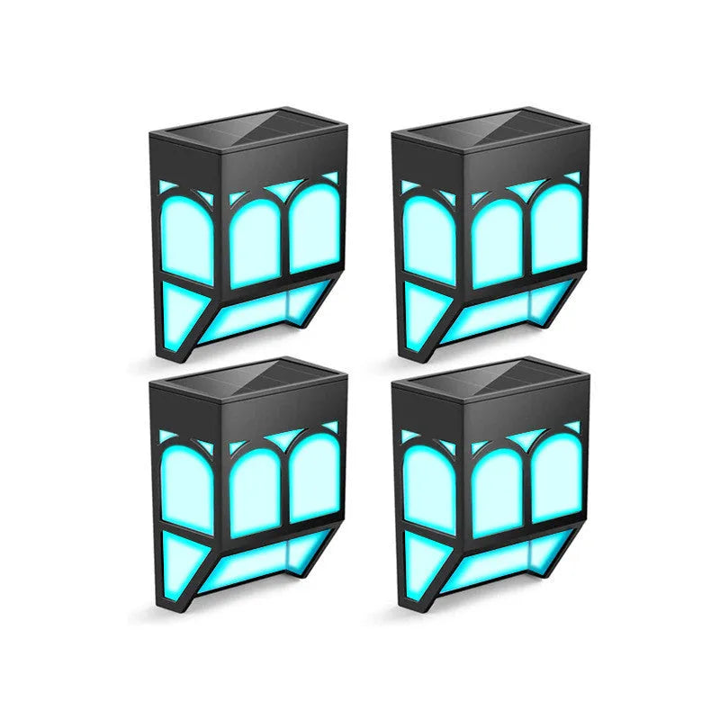 Solar-powered outdoor wall lamp with IP67 waterproof rating mounted on garden fence