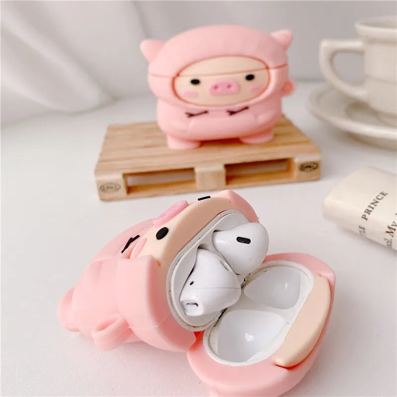 Pink silicone AirPods case with cartoon pig design and textured sweater finish