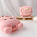 Pink silicone AirPods case with cartoon pig design and textured sweater finish