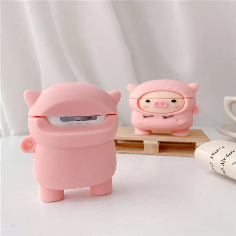 Pink silicone AirPods case with cartoon pig design and textured sweater finish