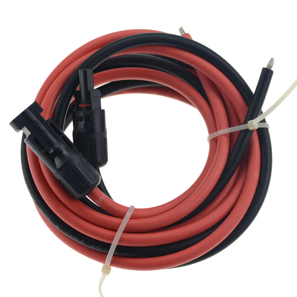 Black MC4 connector solar panel extension cable coiled next to a solar panel.