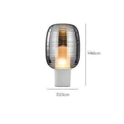 Modern glass table lamp in cognac colour with simple Nordic design and LED light source