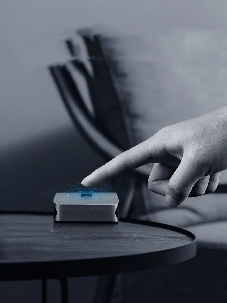 Gray Haibeisi HDMI switcher unit showing one input and two output ports for splitting a video signal.