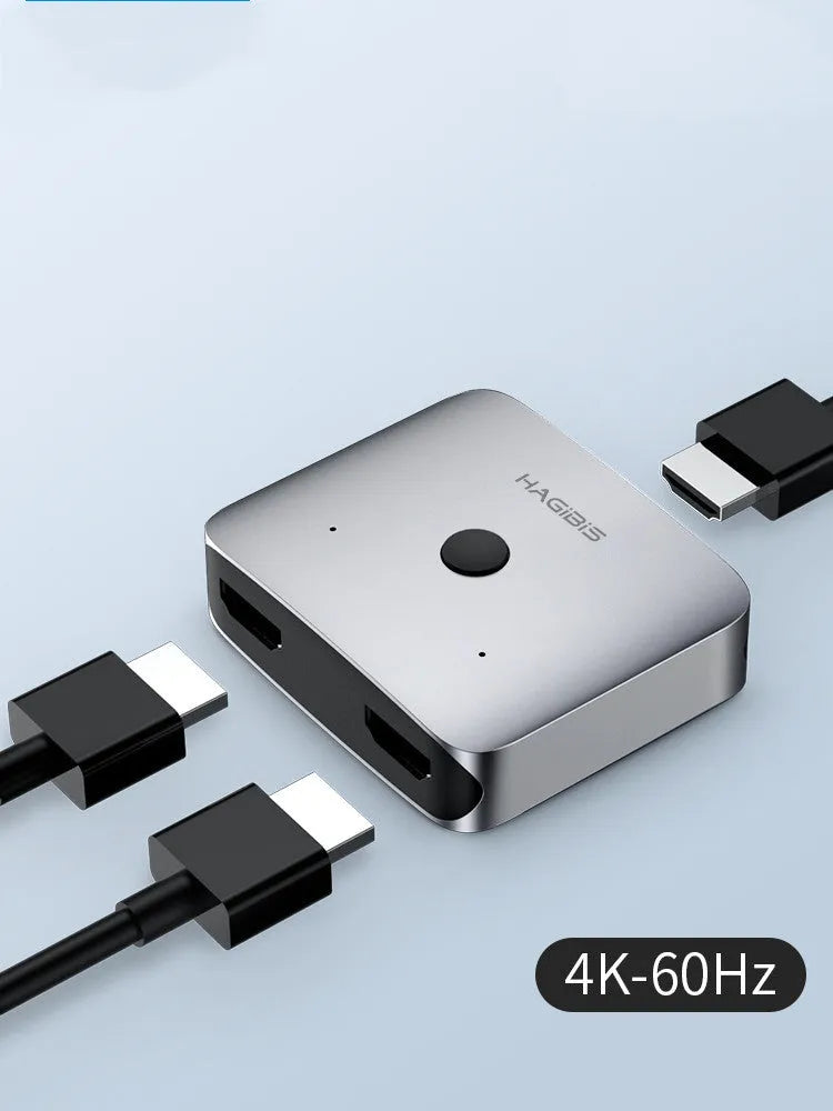 Gray Haibeisi HDMI switcher unit showing one input and two output ports for splitting a video signal.