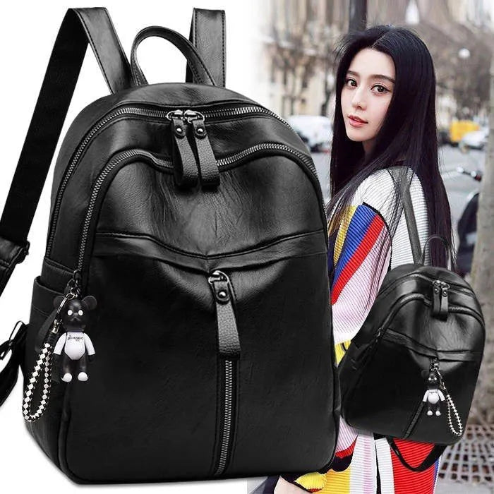 Black soft surface PU leather backpack with double straps and 20-35L capacity