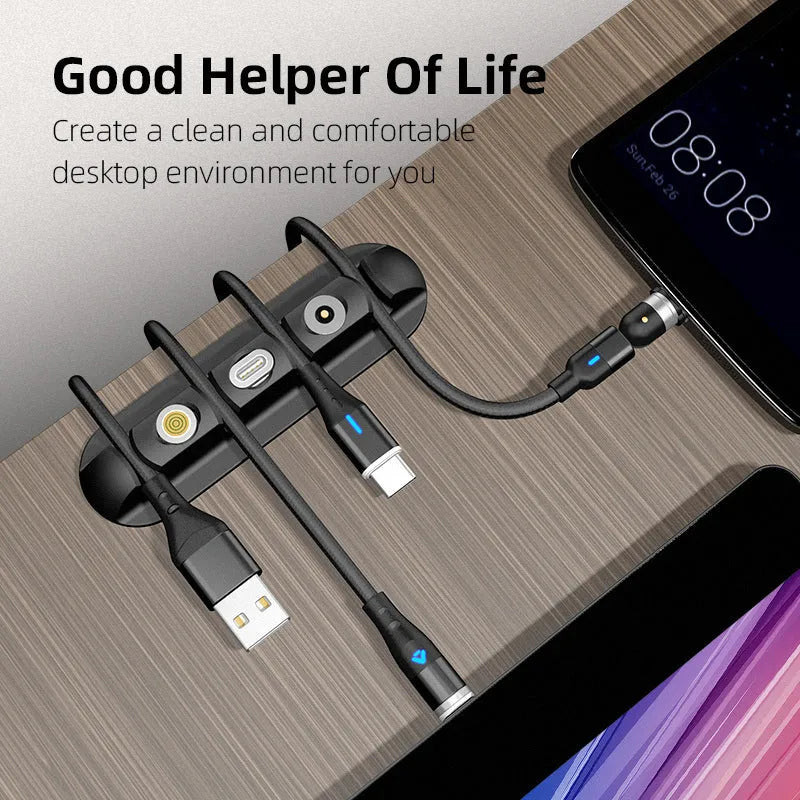Black soft plastic desktop cable organiser with magnetic charging cable holder.