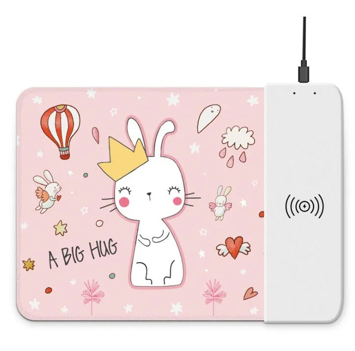 Black wireless charging mouse pad with cartoon design, RGB edge lighting, and non-slip rubber base.