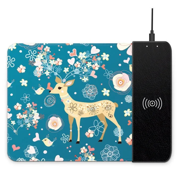 Black wireless charging mouse pad with cartoon design, RGB edge lighting, and non-slip rubber base.