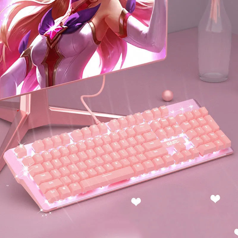 Pink mechanical keyboard and wired mouse gaming set on desk