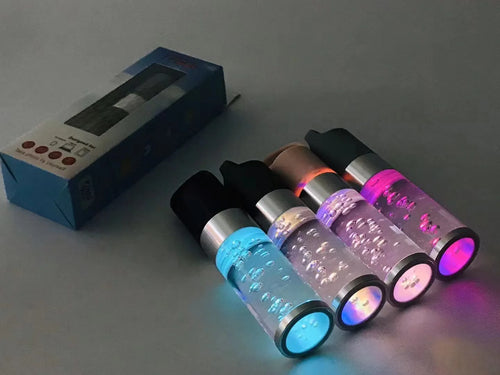 Portable Bluetooth speaker with colourful crystal light in pink, black, silver grey, or green