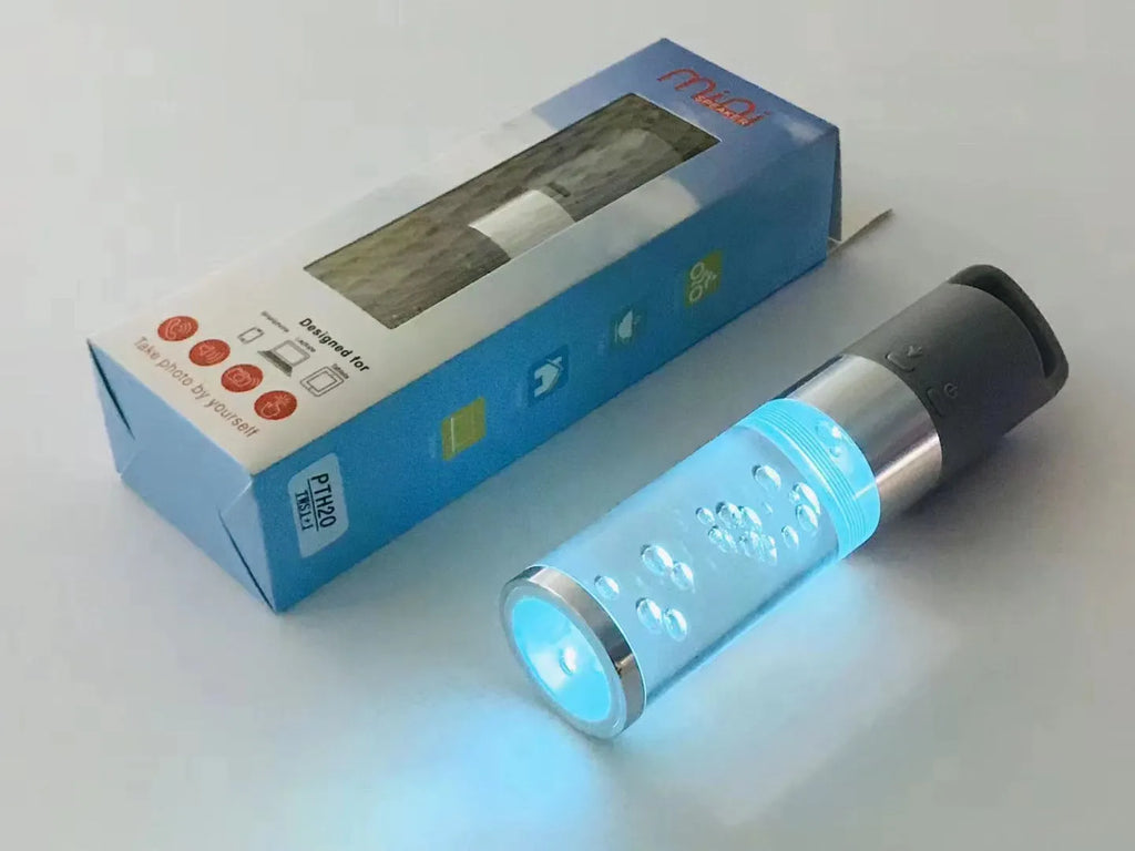 Portable Bluetooth speaker with colourful crystal light in pink, black, silver grey, or green