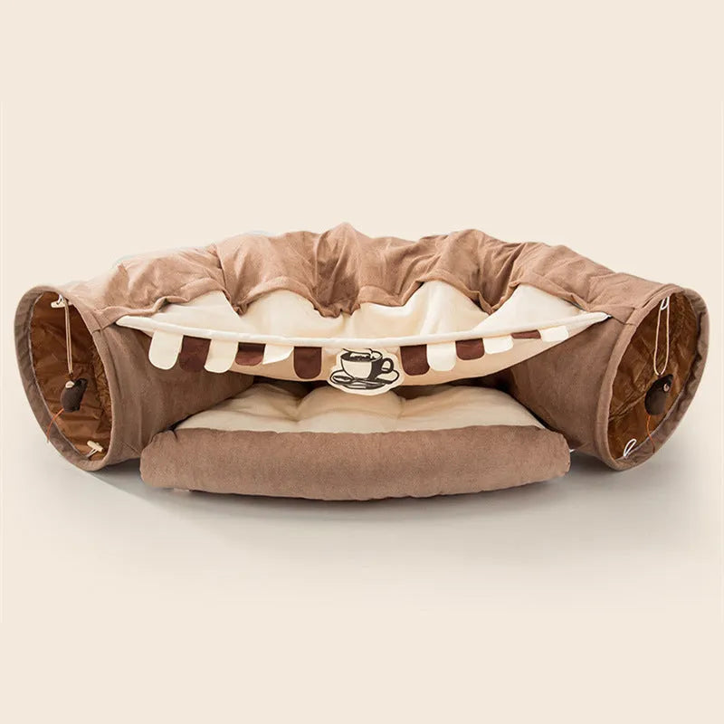 Collapsible cloth cat tunnel in Pink colour, shown extended for play.