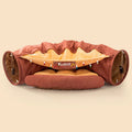 Collapsible cloth cat tunnel in Pink colour, shown extended for play.