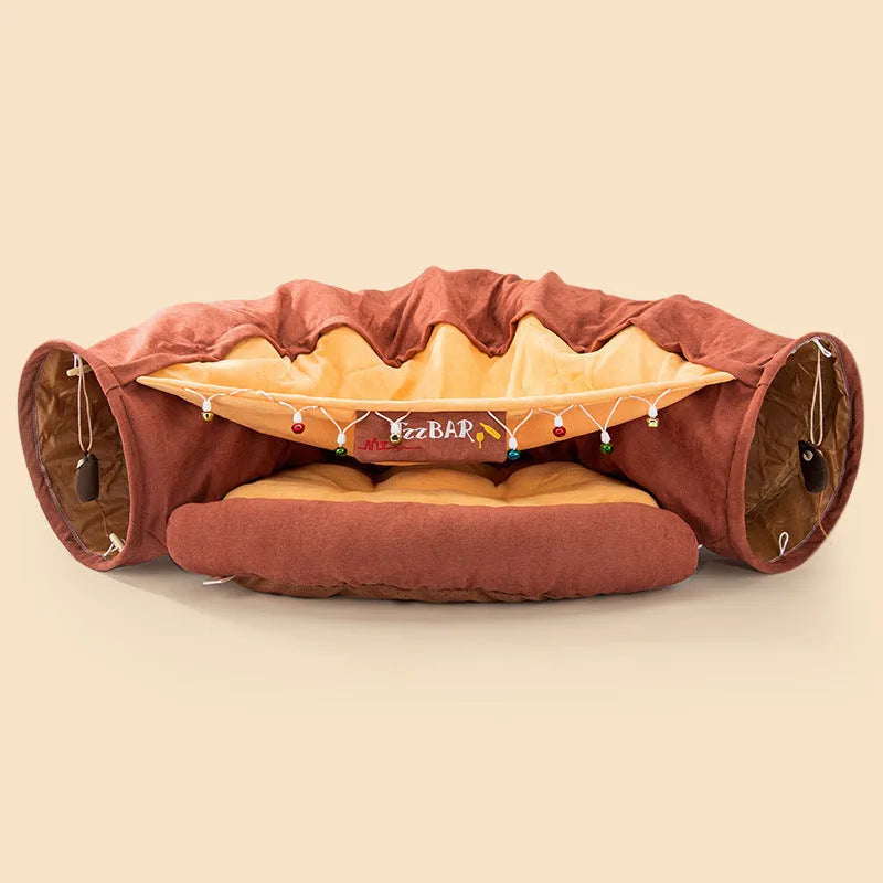 Collapsible cloth cat tunnel in Pink colour, shown extended for play.
