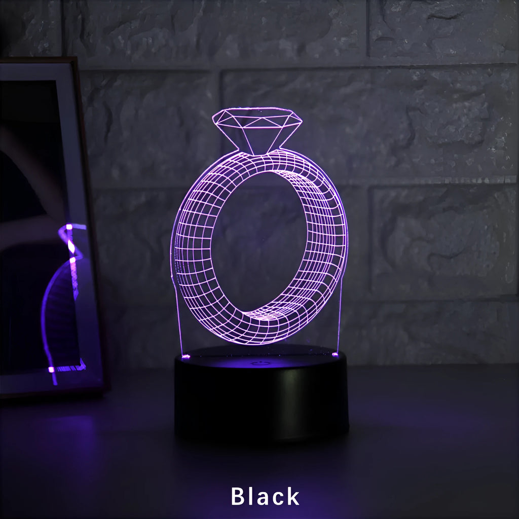 3D LED night light projecting illuminated diamond ring image with colour-changing glow.