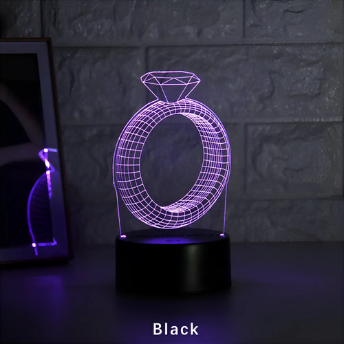 3D LED night light projecting illuminated diamond ring image with colour-changing glow.
