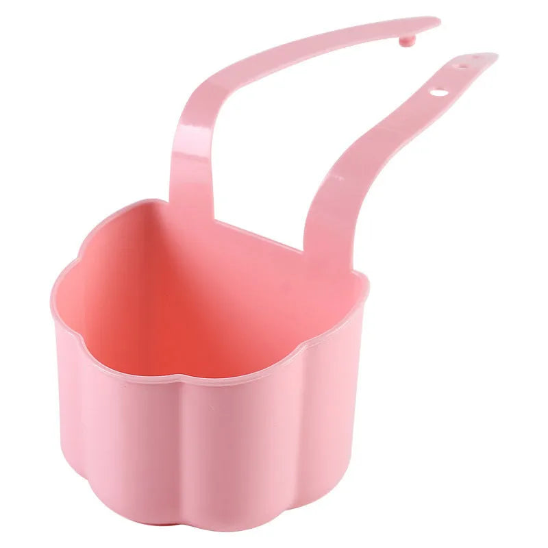 Dark blue Nordic style plastic drain basket next to a kitchen sink