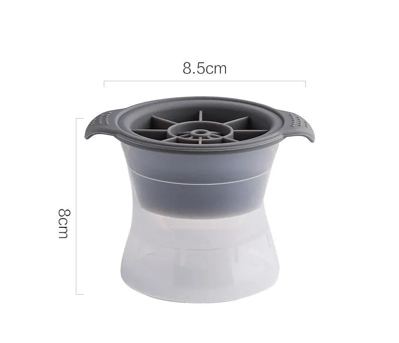 Silicone ice tray showing hockey puck moulds and spherical ice moulds in light blue colour