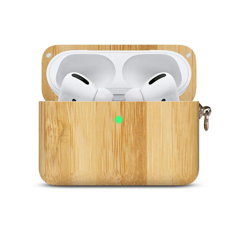 Solid wood Bluetooth earphone sleeve in a choice of natural wood finishes next to wireless earphones