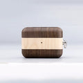 Solid wood Bluetooth earphone sleeve in a choice of natural wood finishes next to wireless earphones