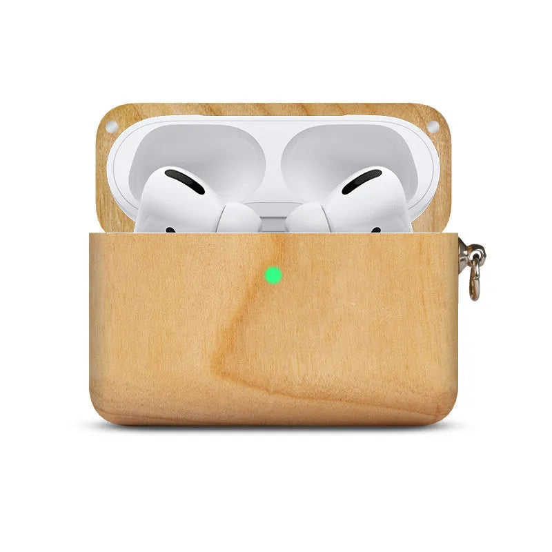 Solid wood Bluetooth earphone sleeve in a choice of natural wood finishes next to wireless earphones
