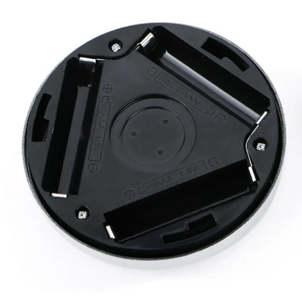 Silver circular wireless motion sensor night light unit showing 80mm diameter size