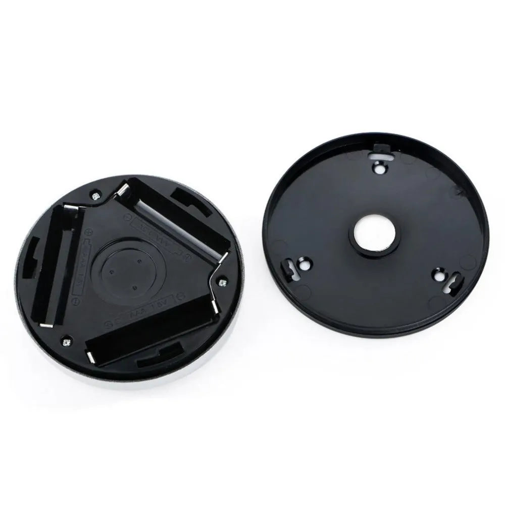 Silver circular wireless motion sensor night light unit showing 80mm diameter size