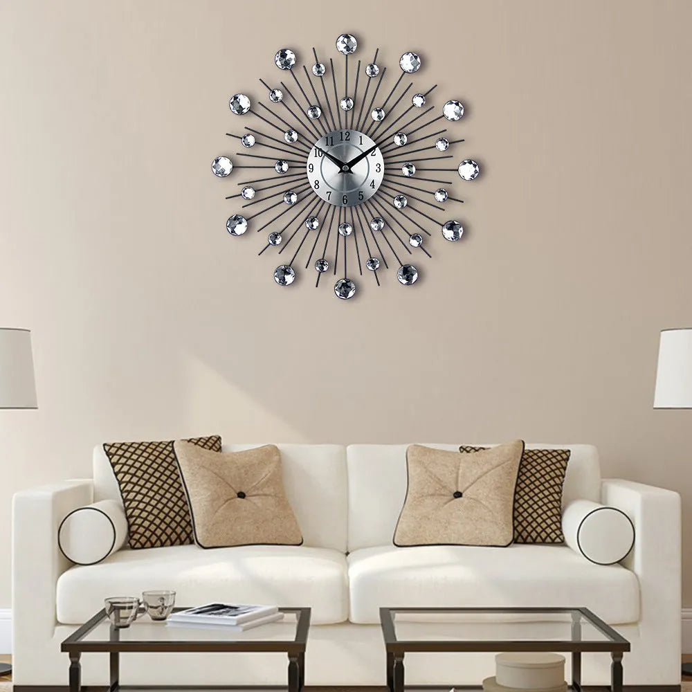 Silver round 33cm mute wall clock with metal case and aluminium dial.