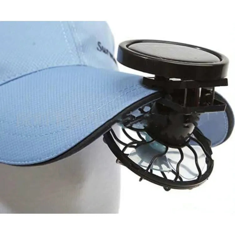 Black solar powered clip-on fan panel for outdoor cooling during camping and fishing