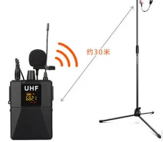 Black Little Bee X3 wireless lavalier clip-on microphone with a separate wind foam cover on a white background.