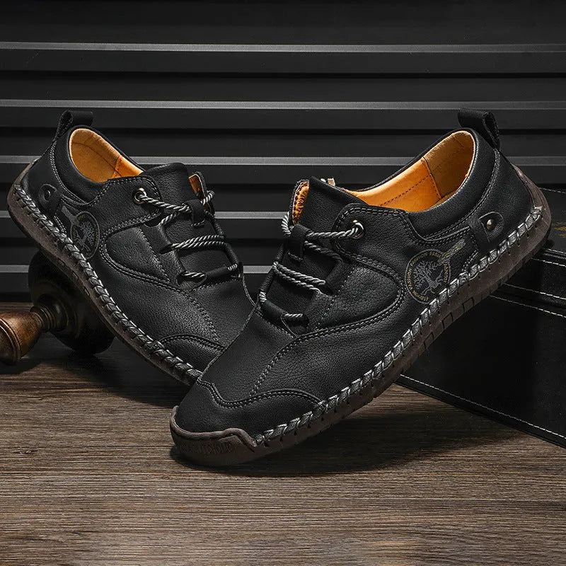 Men's black microfiber casual shoes with round toe design on neutral background