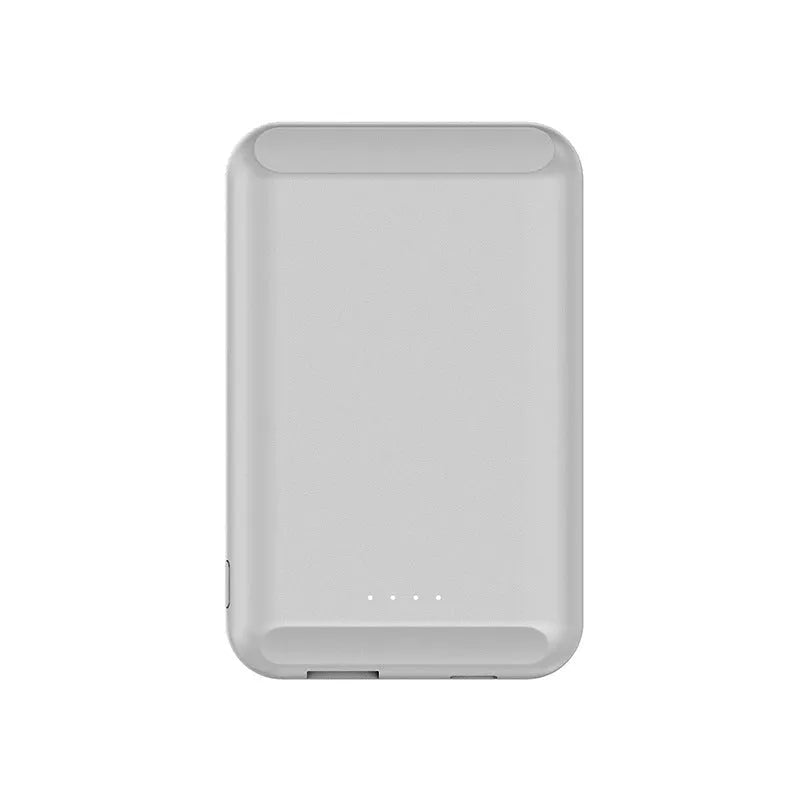 A black magnetic wireless power bank with a 5000mAh capacity, shown next to a smartphone.