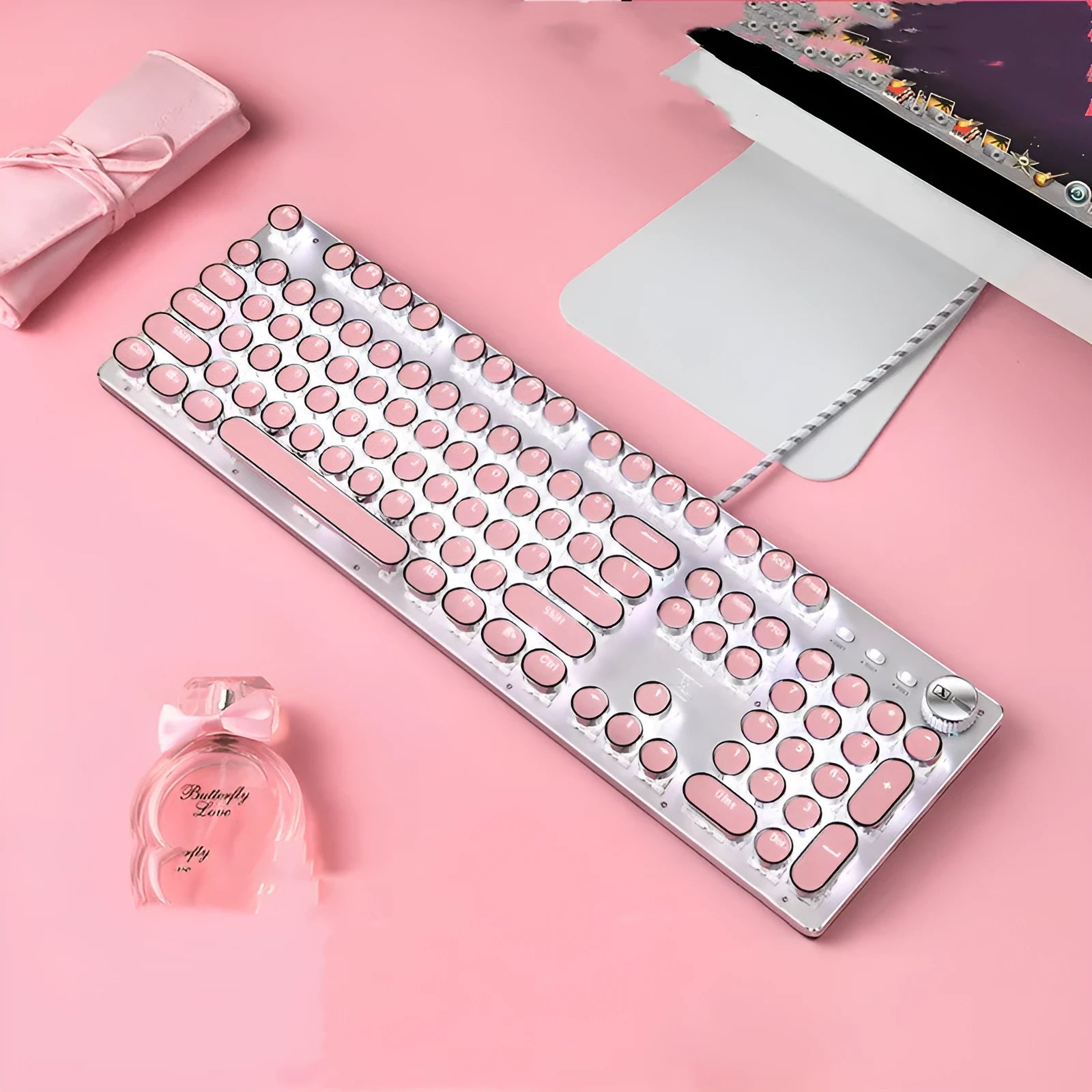 Queen Lipstick mechanical keyboard with green switches, silver base, pink accents, and white backlighting