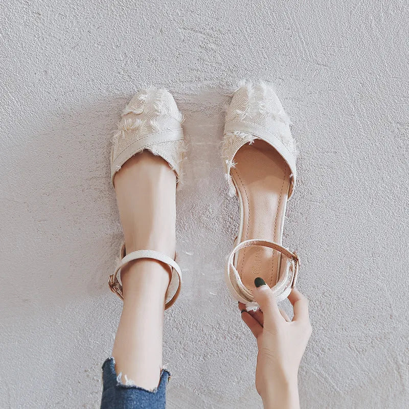 Women's apricot ankle strap Dorsay flats with a low heel on a white background