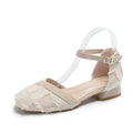 Women's apricot ankle strap Dorsay flats with a low heel on a white background