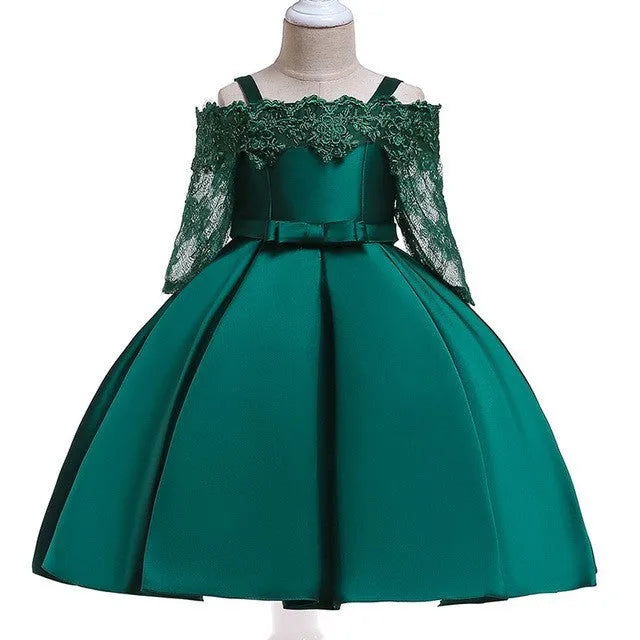 Girls lace-trimmed dress in simple style shown in dark red, pink, red, white and green colour options.