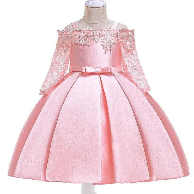 Girls lace-trimmed dress in simple style shown in dark red, pink, red, white and green colour options.