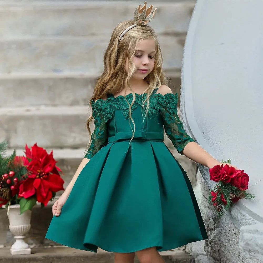 Girls lace-trimmed dress in simple style shown in dark red, pink, red, white and green colour options.