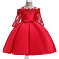 Girls lace-trimmed dress in simple style shown in dark red, pink, red, white and green colour options.