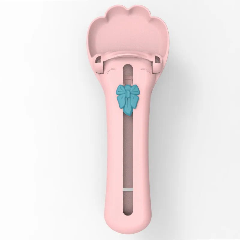 22cm green and pink pet food squeezer scoop with clear reservoir and soft silicone tip
