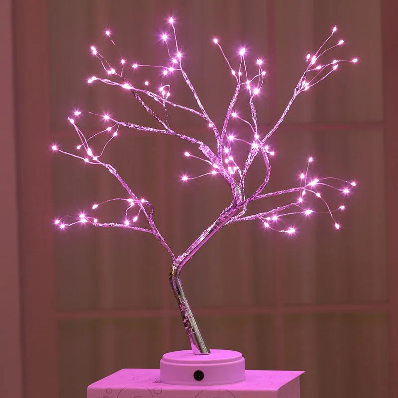 White LED Christmas tree shaped night light with touch base, standing 50cm tall on a table.