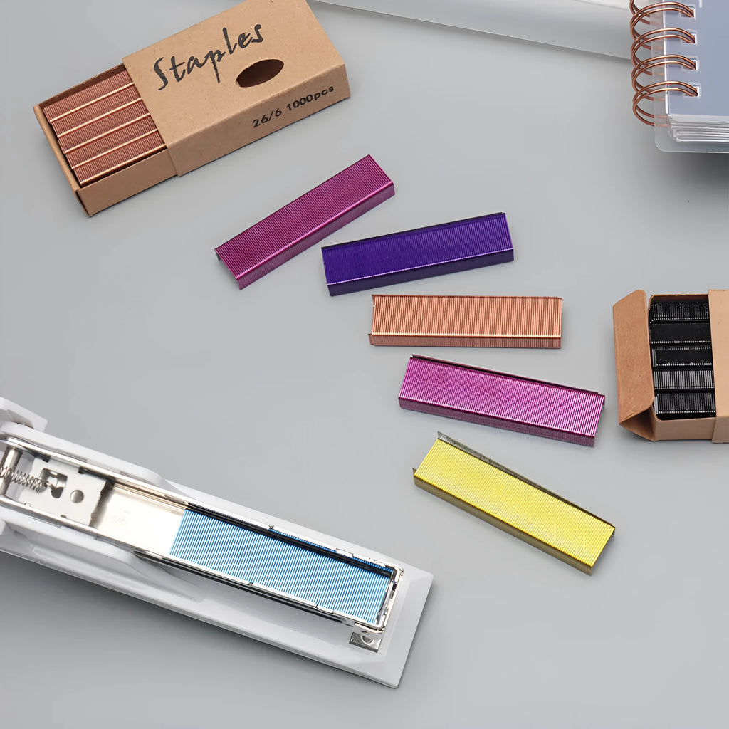 Open box showing 1000 metal staples in a choice of black, purple, rose gold, or rose red colours