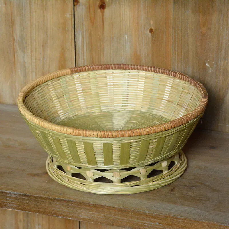 Handmade natural bamboo storage basket shown in one of three size options for household organisation.